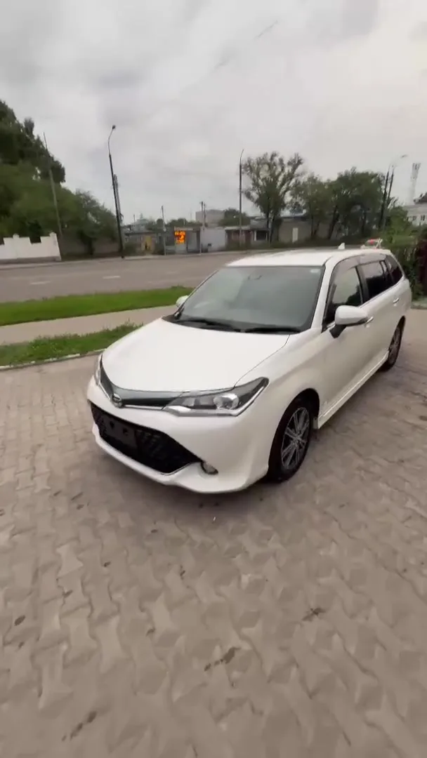 Toyota Corolla Fielder 2015 — фото 1